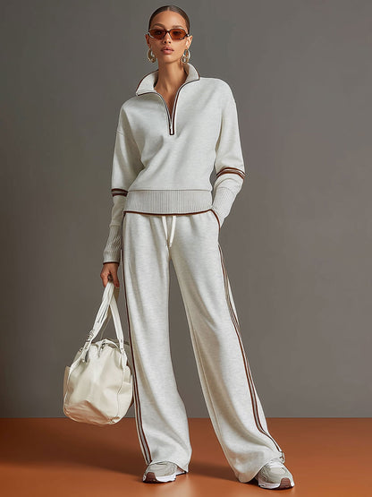 Woman wearing relaxed blouse and wide leg pants set