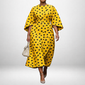 Lumira | Flowing Polka Dot Midi Dress