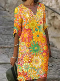 Nira | Breezy Floral Midi Dress