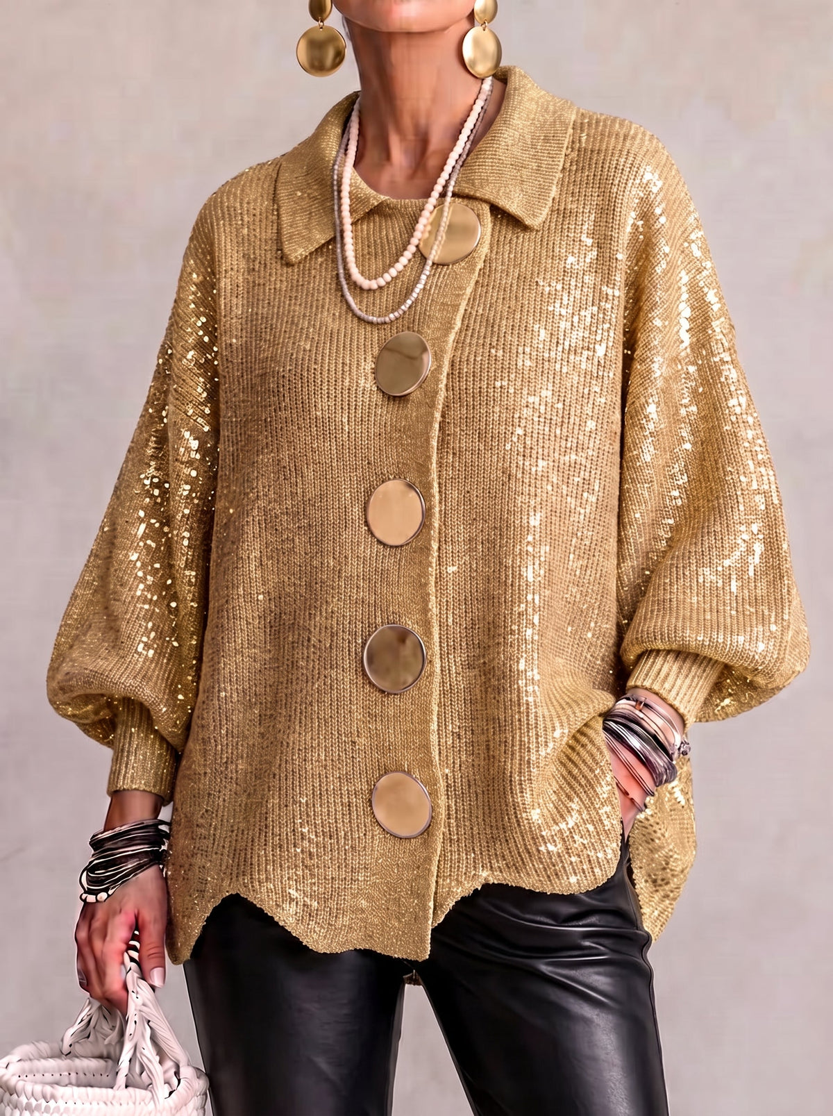 Woman wearing oversized cardigan with lantern sleeves