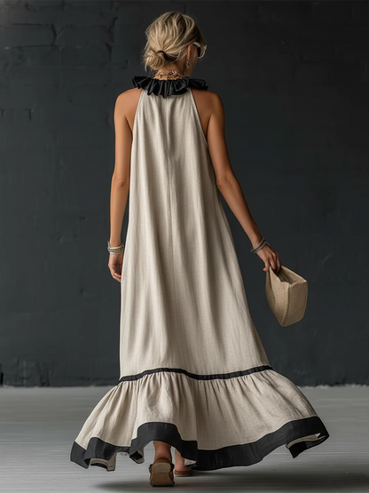 Woman wearing ruffled color-block maxi dress outdoors