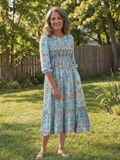 Porcia | Floral Smocked Midi Dress
